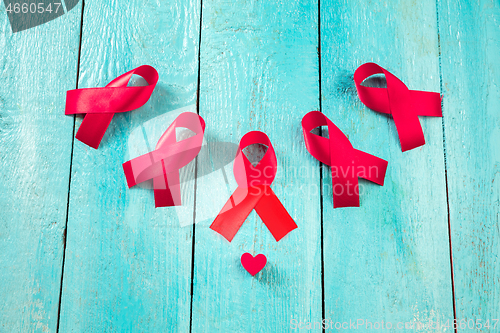 Image of Aids Awareness Sign Red Ribbon. World Aids Day concept.