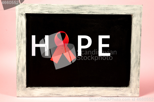 Image of Aids Awareness Sign Red Ribbon. World Aids Day concept.