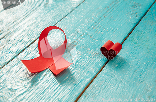 Image of Aids Awareness Sign Red Ribbon. World Aids Day concept.