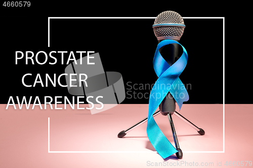 Image of Blue ribbon symbolic of prostate cancer awareness campaign and men\'s health in November