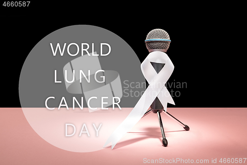 Image of lung cancer ribbon, white ribbon, a symbol of the fight against lung cancer