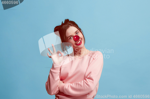 Image of Happy woman on red nose day.