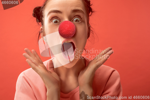 Image of Happy woman on red nose day.