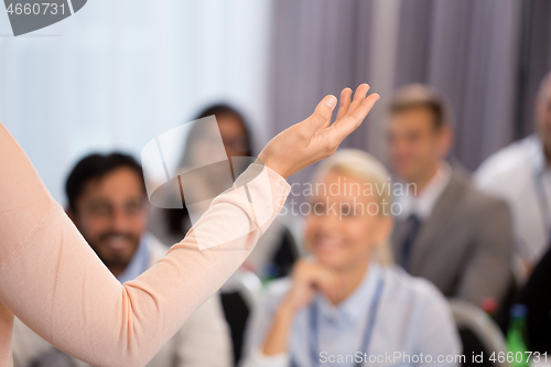 Image of group of people at business conference or lecture