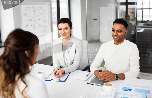 Image of recruiters having job interview with employee