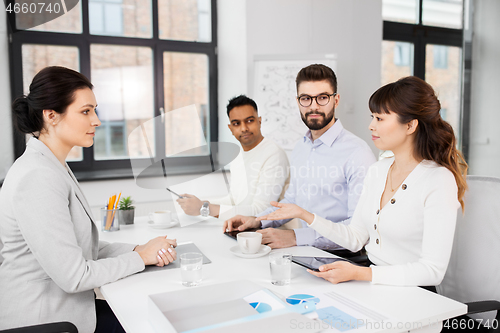 Image of recruiters having job interview with employee