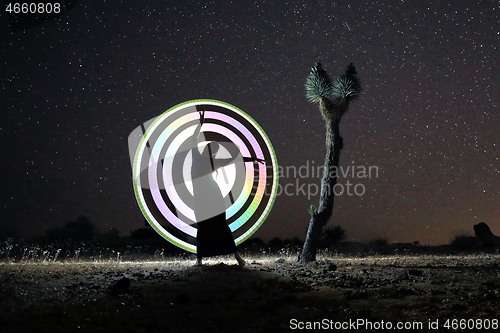 Image of Person Light Painted in the Desert Under the Night Sky