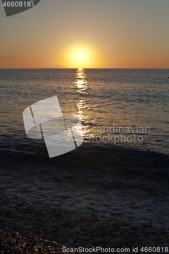 Image of Red sunset over the sea. Beautiful sunset. 