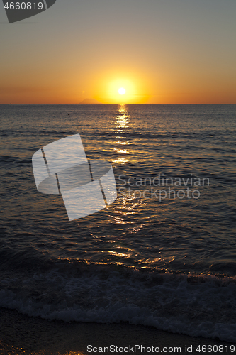 Image of Red sunset over the sea. Beautiful sunset.