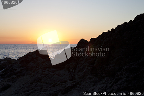 Image of Sunset on the rocky shore. Tyrrhenian Sea.