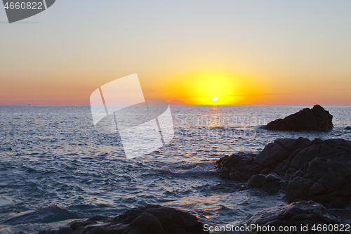 Image of Sunset on the rocky shore. Tyrrhenian Sea.