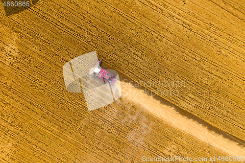 Image of Top view of combine on harvest field