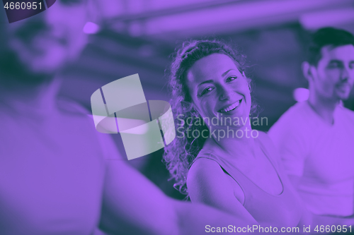 Image of Group of people running on treadmills