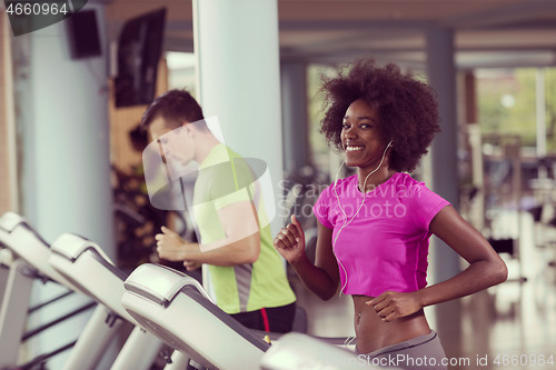 Image of people exercisinng a cardio on treadmill