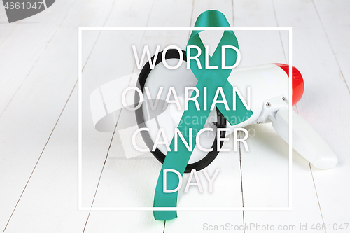 Image of Teal ribbon. Ovarian cancer awareness. Healthcare and medicine concept.