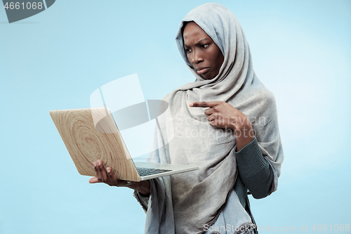 Image of Portrait Of Female University Student Working on laptop