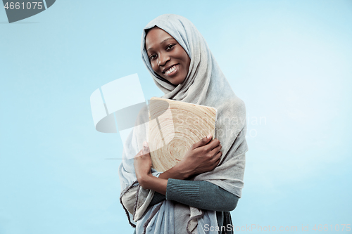 Image of Portrait Of Female University Student Working on laptop