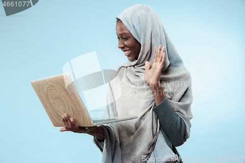 Image of Portrait Of Female University Student Working on laptop