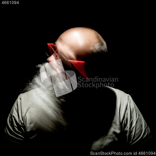 Image of bearded man motion blur portrait