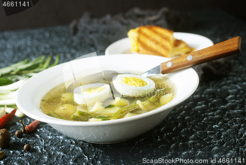 Image of soup with vegetables and egg