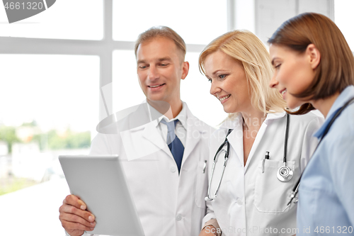 Image of group of doctors with tablet computer at hospital