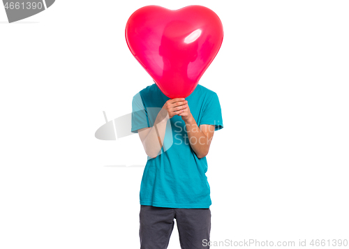 Image of Boy with heart shaped balloon