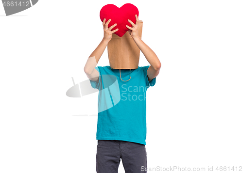 Image of Boy with paper bag over head