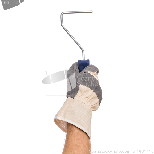 Image of Hand with glove and paint roller