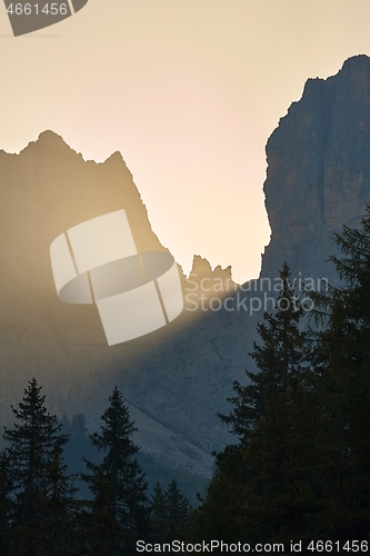 Image of Sunrise between mountain cliffs