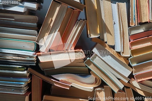 Image of Wall of books piled up