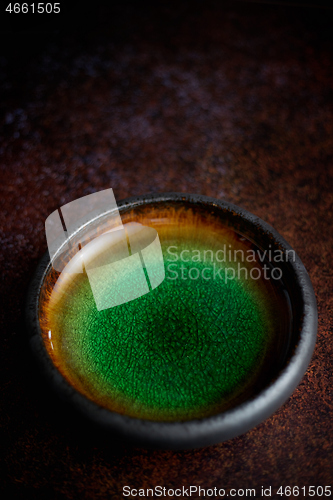 Image of Handmade brown and green glaze rustic pottery bowl