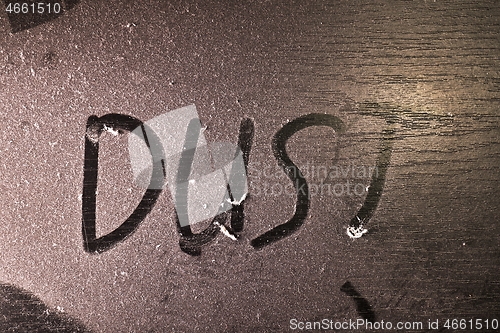 Image of Dust on a table surface