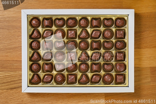 Image of Open box of chocolate treets