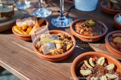 Image of Tapas served in many small plates