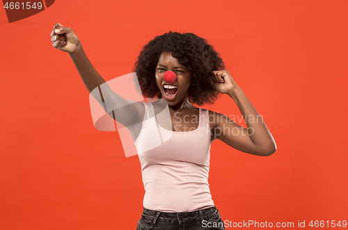 Image of Happy african woman on red nose day.