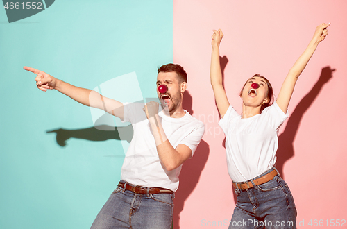 Image of Happy man and woman at red nose day.