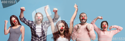 Image of The collage of faces of surprised people on coral backgrounds.