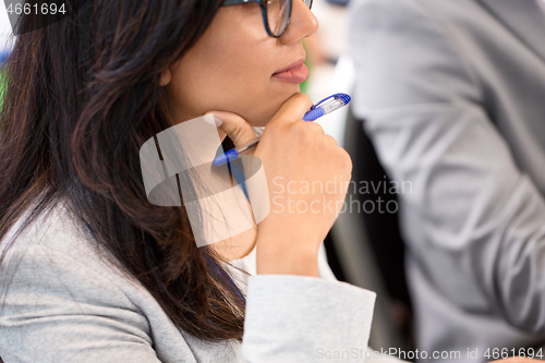 Image of close up of businesswoman at business conference