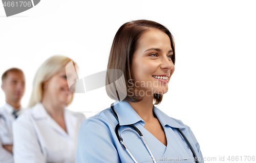 Image of smiling female doctor or nurse in uniform