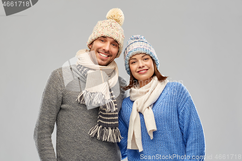 Image of happy couple in winter clothes