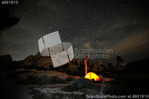 Image of Person Light Painted in the Desert Under the Night Sky