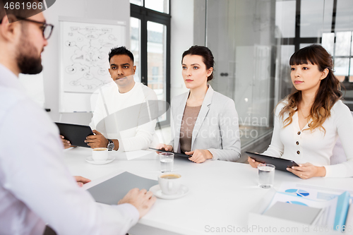 Image of recruiters having job interview with employee