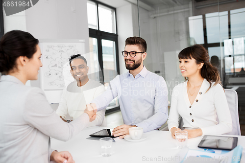 Image of recruiters having interview with employee