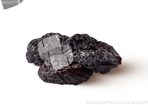 Image of Heap of natural organic sweet prune isolated on a white background.