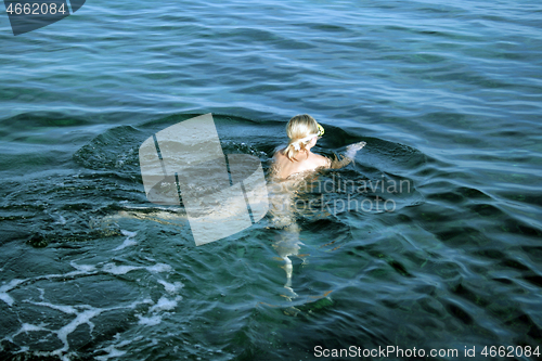 Image of Naked woman on the nudist beach