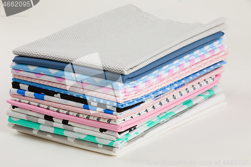 Image of Stack of cotton fabric material