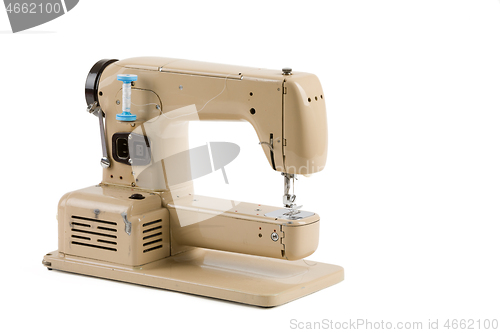 Image of Old vintage sewing machine isolated on white