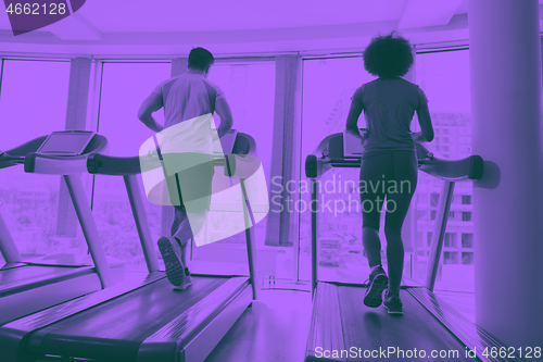 Image of people exercisinng a cardio on treadmill in gym