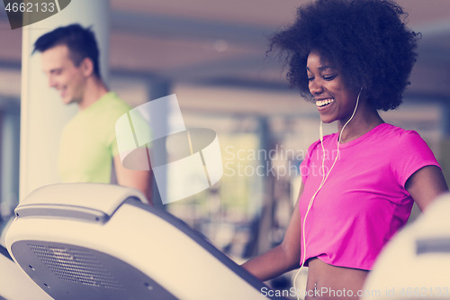 Image of people exercisinng a cardio on treadmill