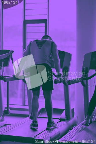 Image of man running on the treadmill